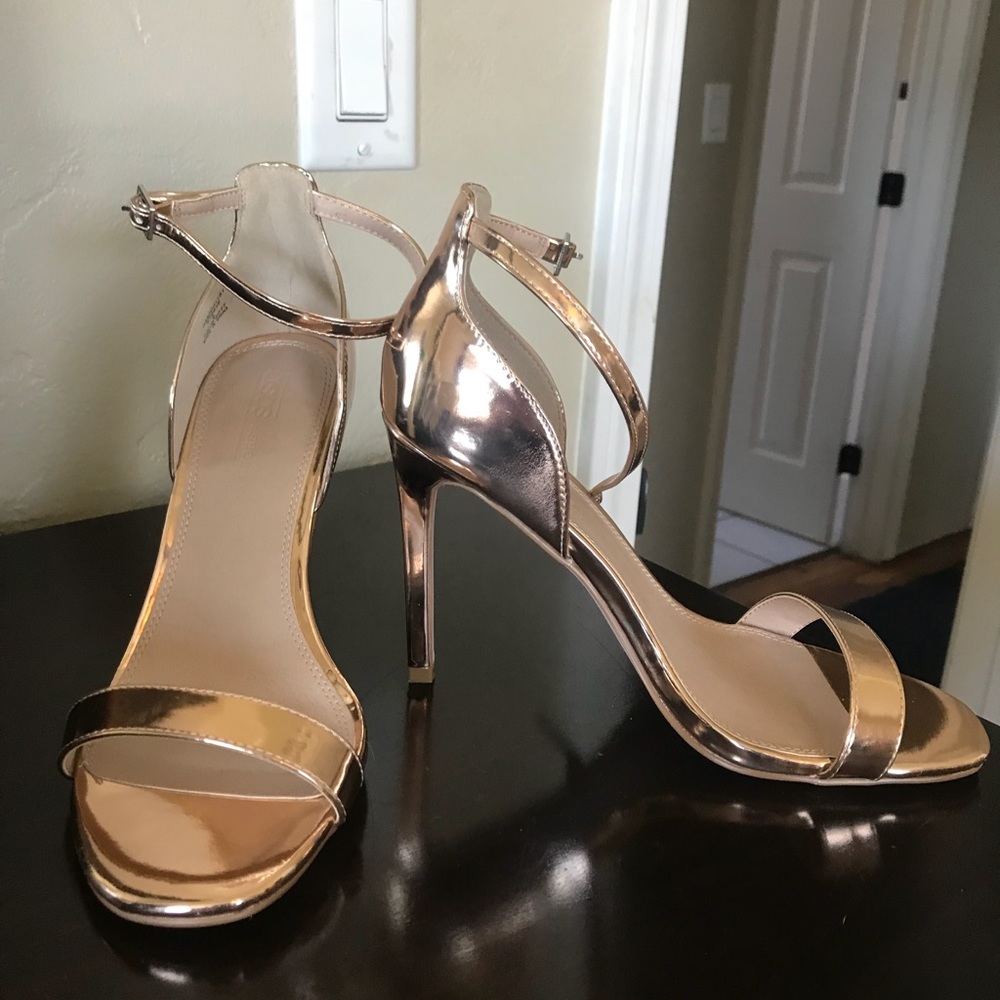 Size 8 rose gold heels.